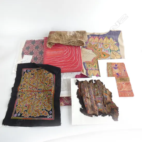 #A collection of assorted ethnic textiles; fragments